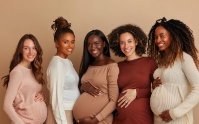 a group of five pregnant women are posing for a photo